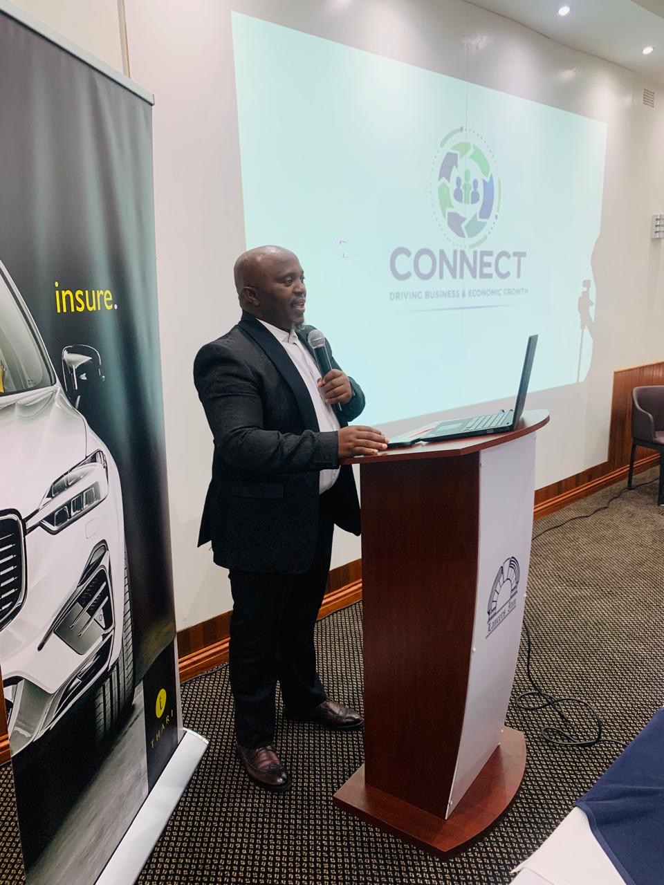 Capital Link Connect — speaker presenting at the podium